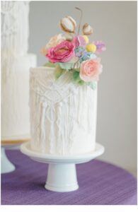 wedding cake with bright flowers