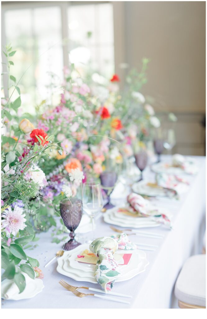 summer flowers decorate table at New Jersey reception