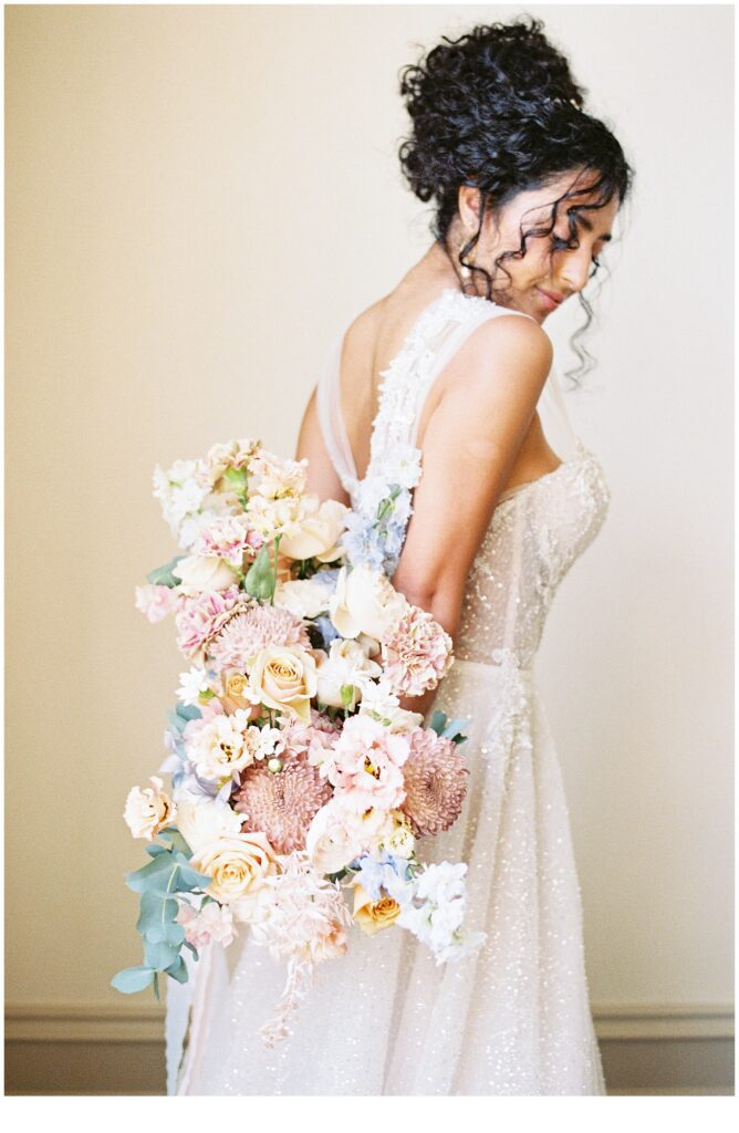 bride holds romantic wedding bouquet