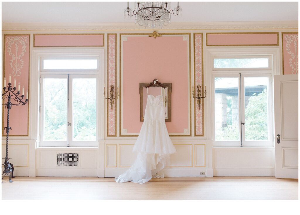 bride's wedding dress hanging up in Cairnwood Estate