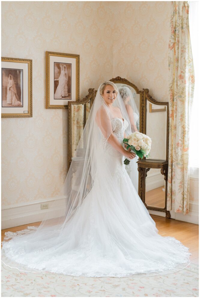 bride in wedding dress and classic wedding bouquet