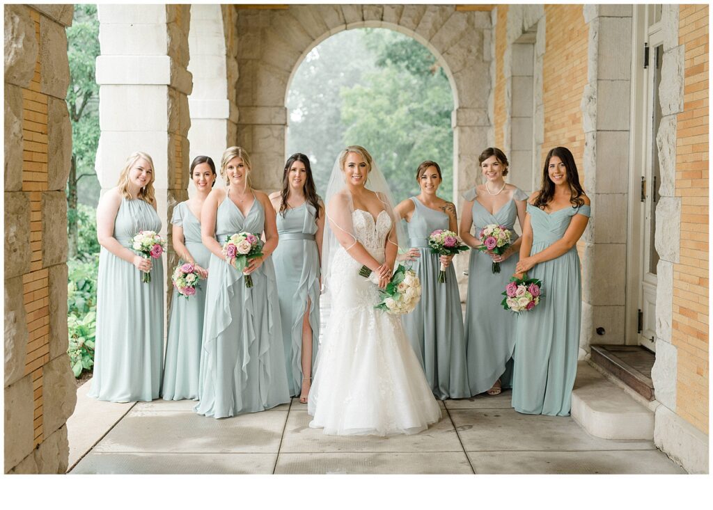 bride and bridesmaids in sage dresses