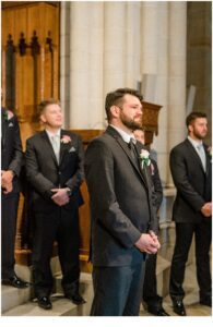 groom waits from bride at wedding ceremony