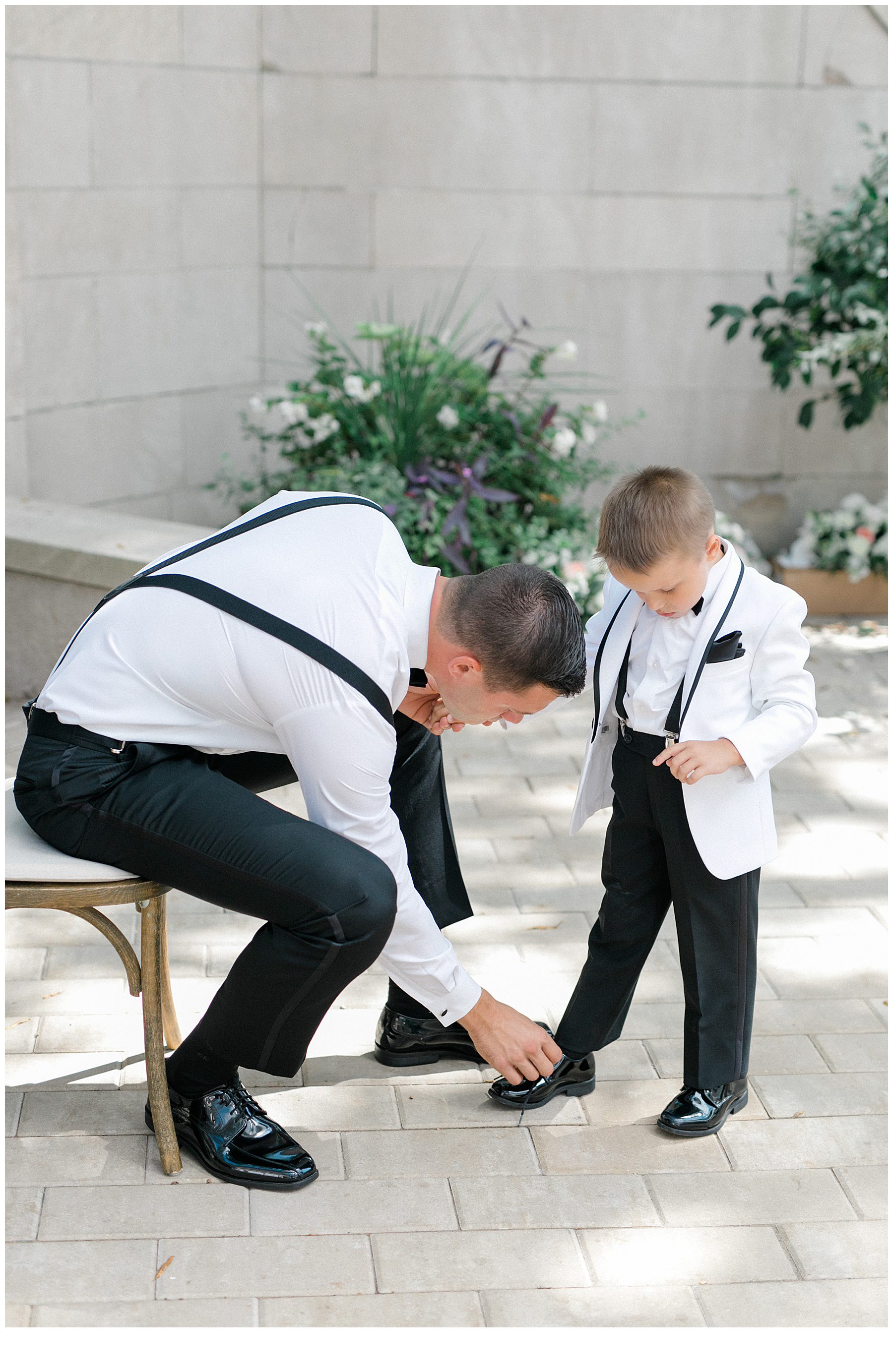 groom helping his son get ready