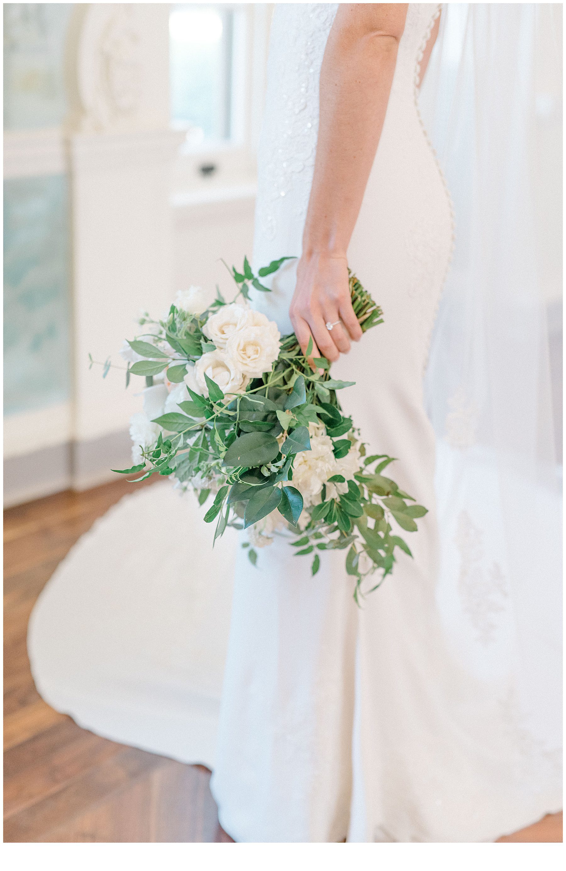 bride holding classic wedding bouquet