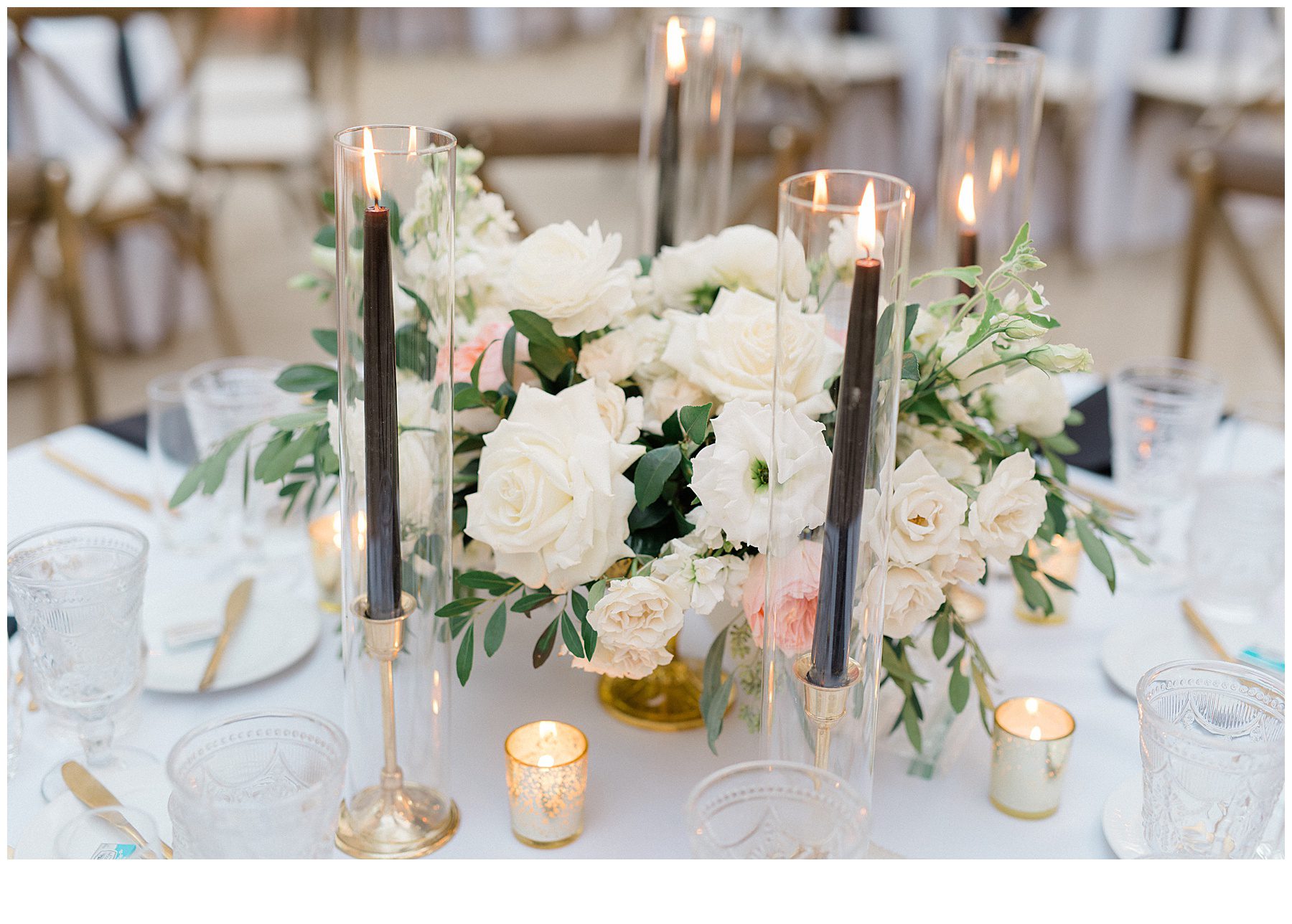 flower centerpieces with black candles