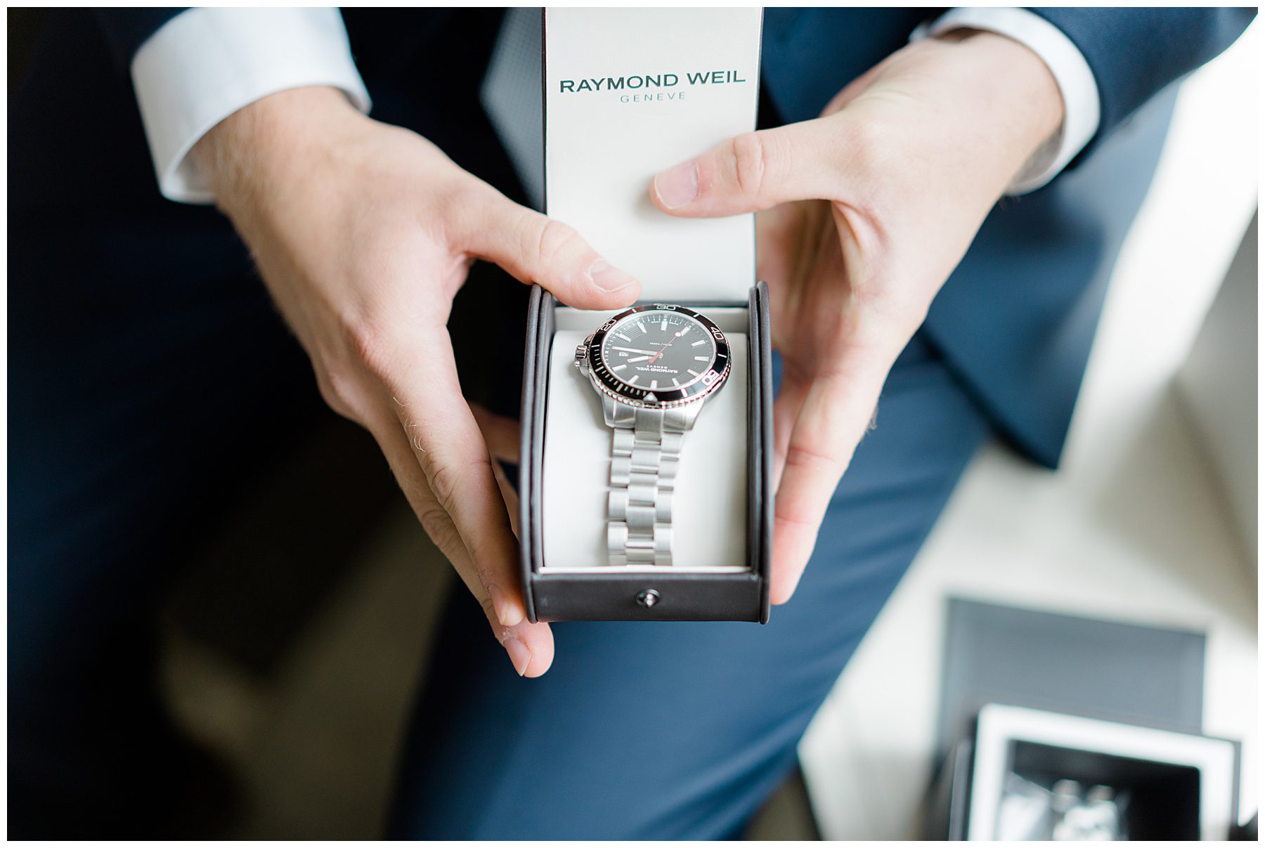 groom opening gift of a watch