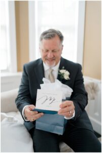 father of the bride opens gift