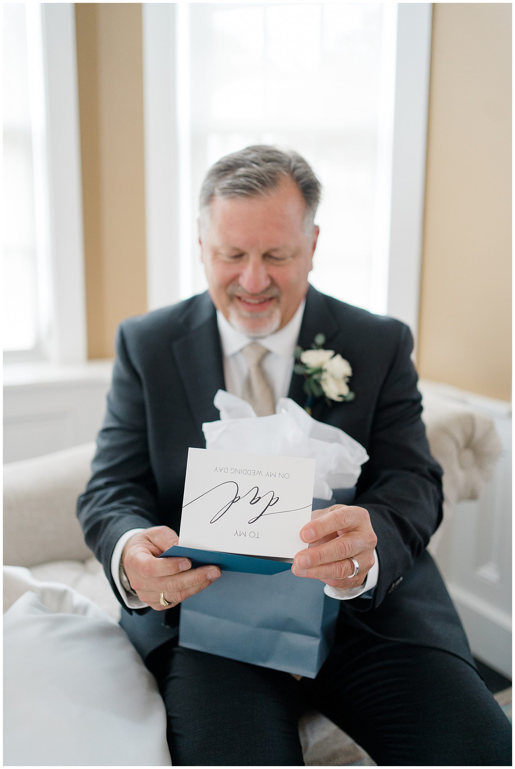 father of the bride opens gift