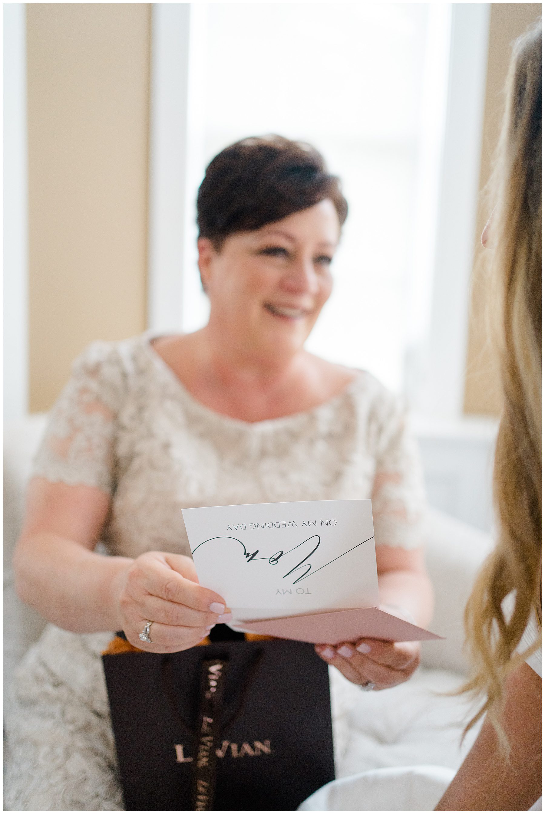 mother of the bride opens her gift