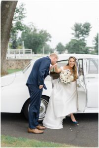 bride gets out of Rolls Royce