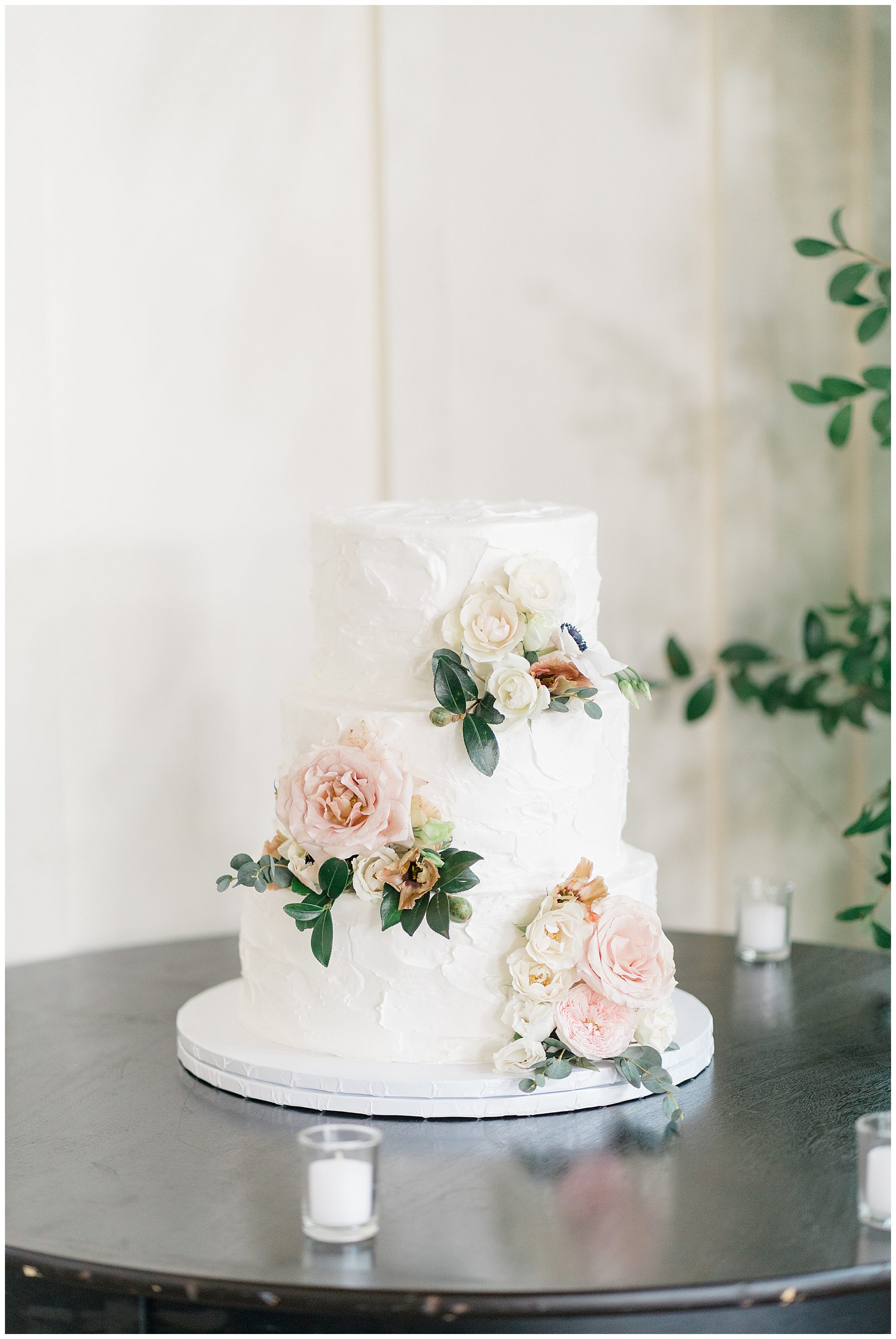 elegant white wedding cake with flowers