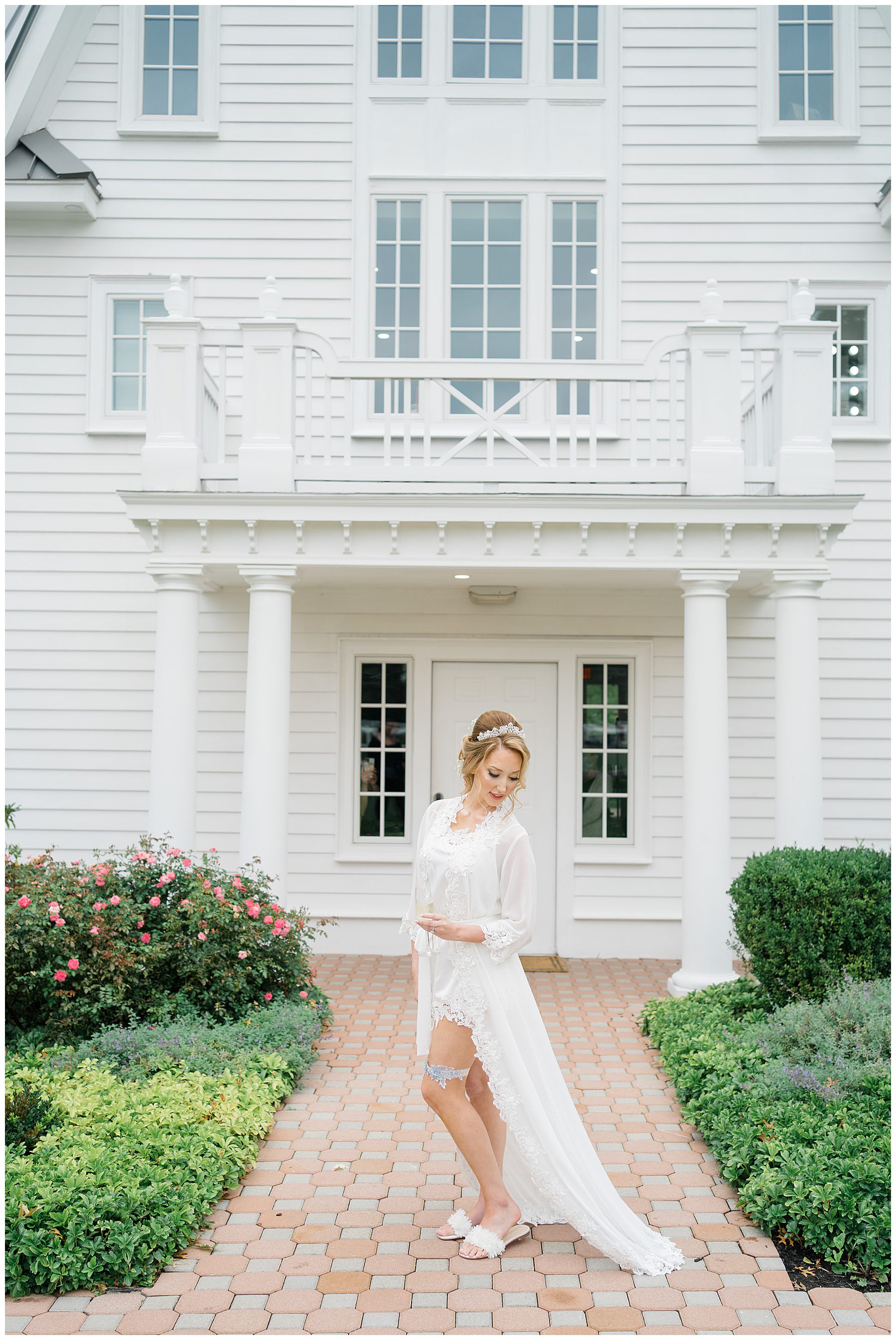 bride in front of Luxurious Ryland Inn