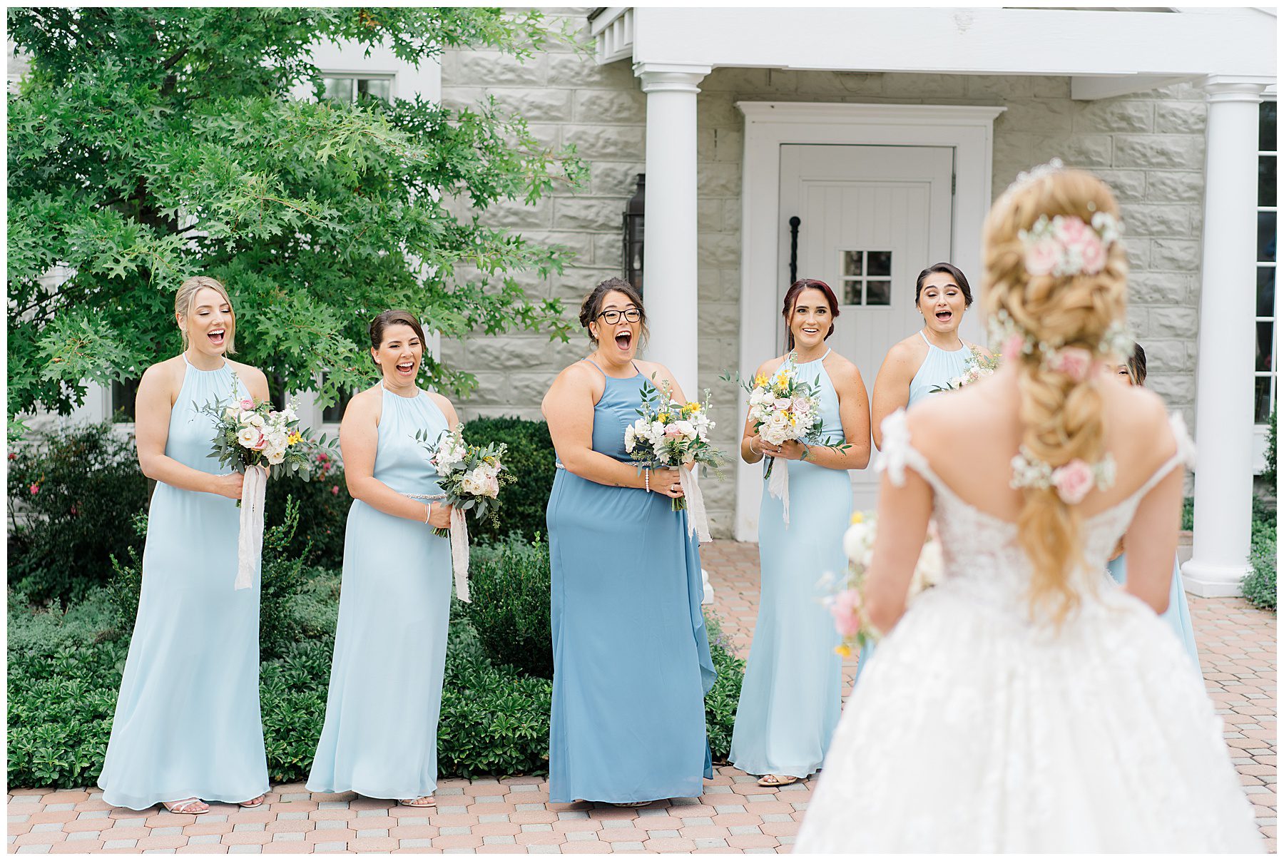 bridesmaids react to seeing bride