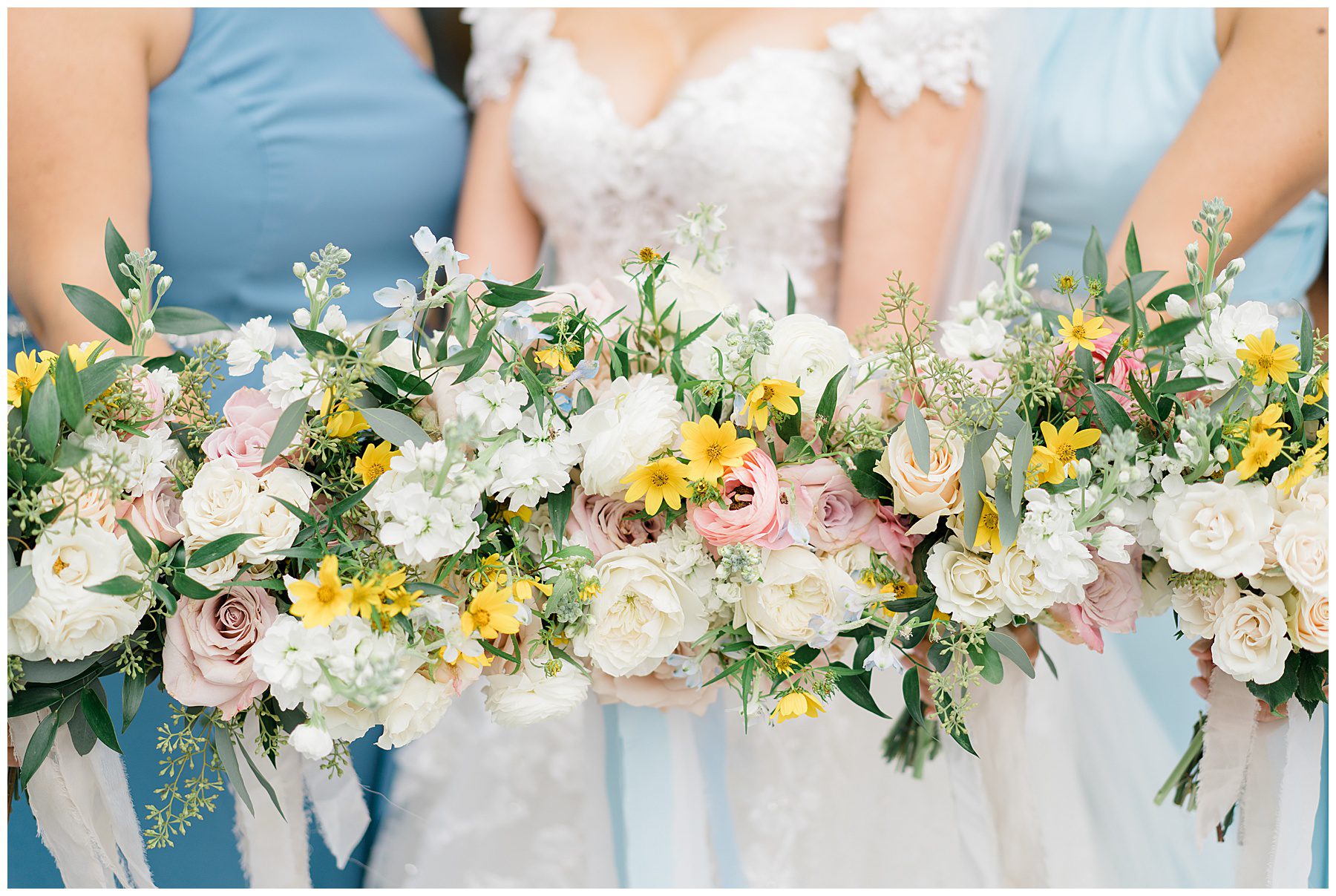 classic wedding bouquet with pops of yellow flowers
