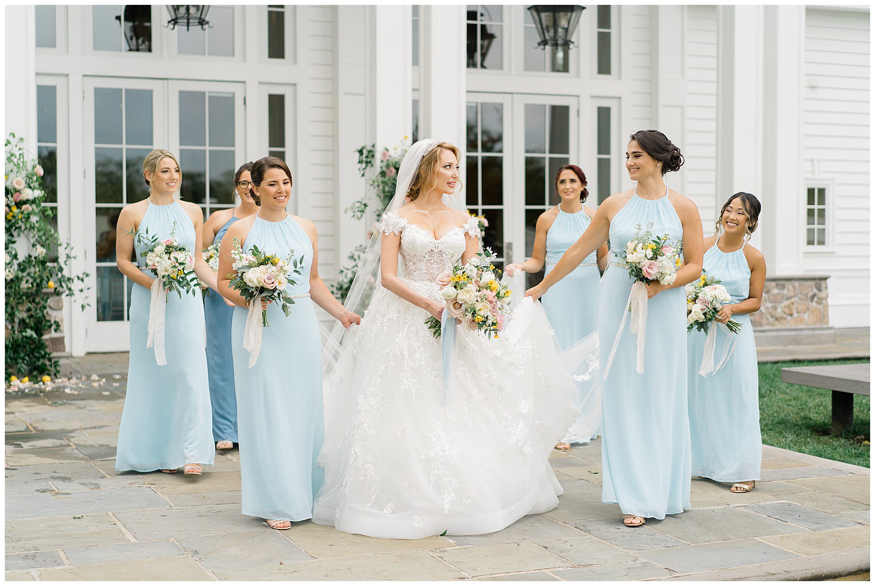 bride with bridesmaids outside of The Ryland Inn in New Jersey