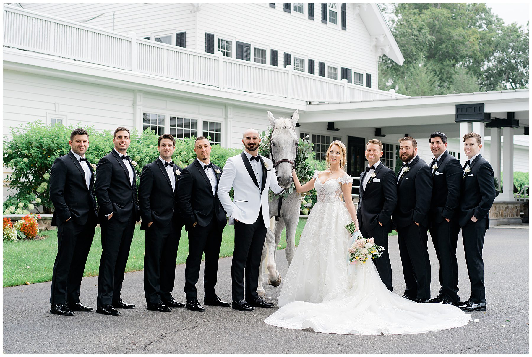 bride and groom with groomsmen