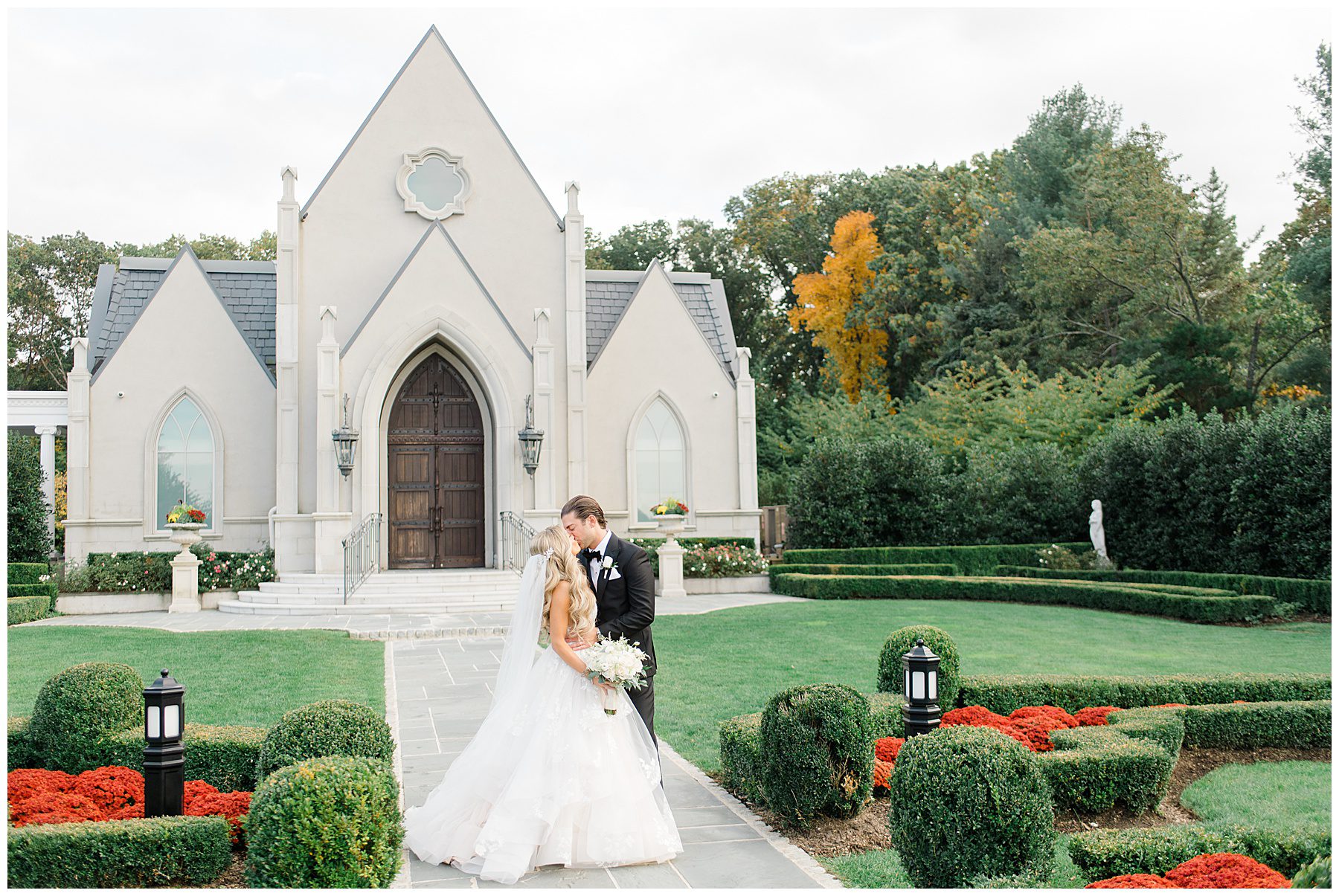 bride and groom kiss during first look before Park Chateau Fall Wedding
