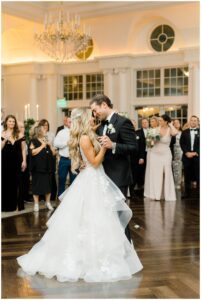 bride and groom dance during Park Chateau Fall Wedding reception
