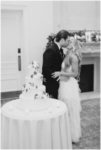 newlyweds kiss at Park Chateau Fall Wedding reception in NJ