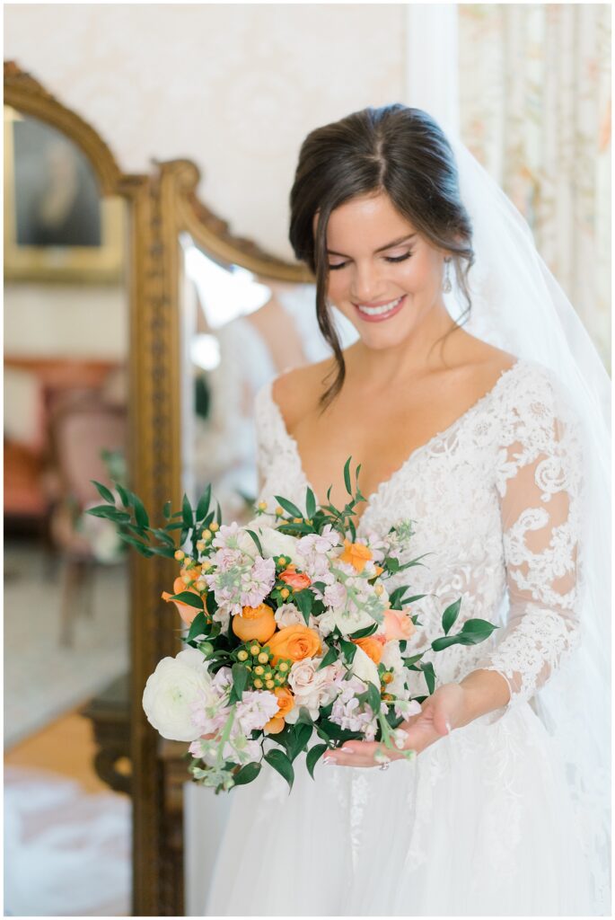 white and coral flower wedding bouquet