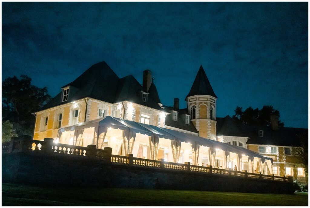 Elegant Cairnwood Estate in Bryn Athyn, PA lit up at night