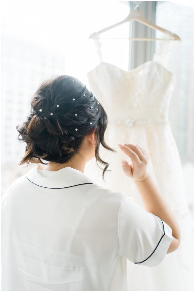 bride getting ready for Winter Wedding at The Lucy by Cescaphe