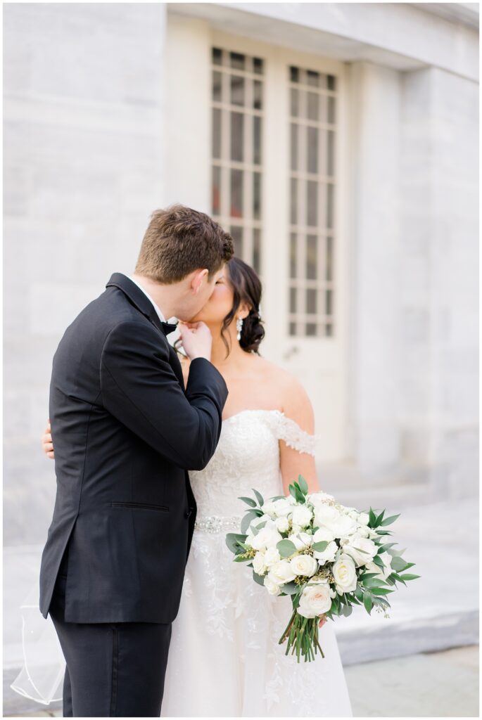 couple kiss before wedding