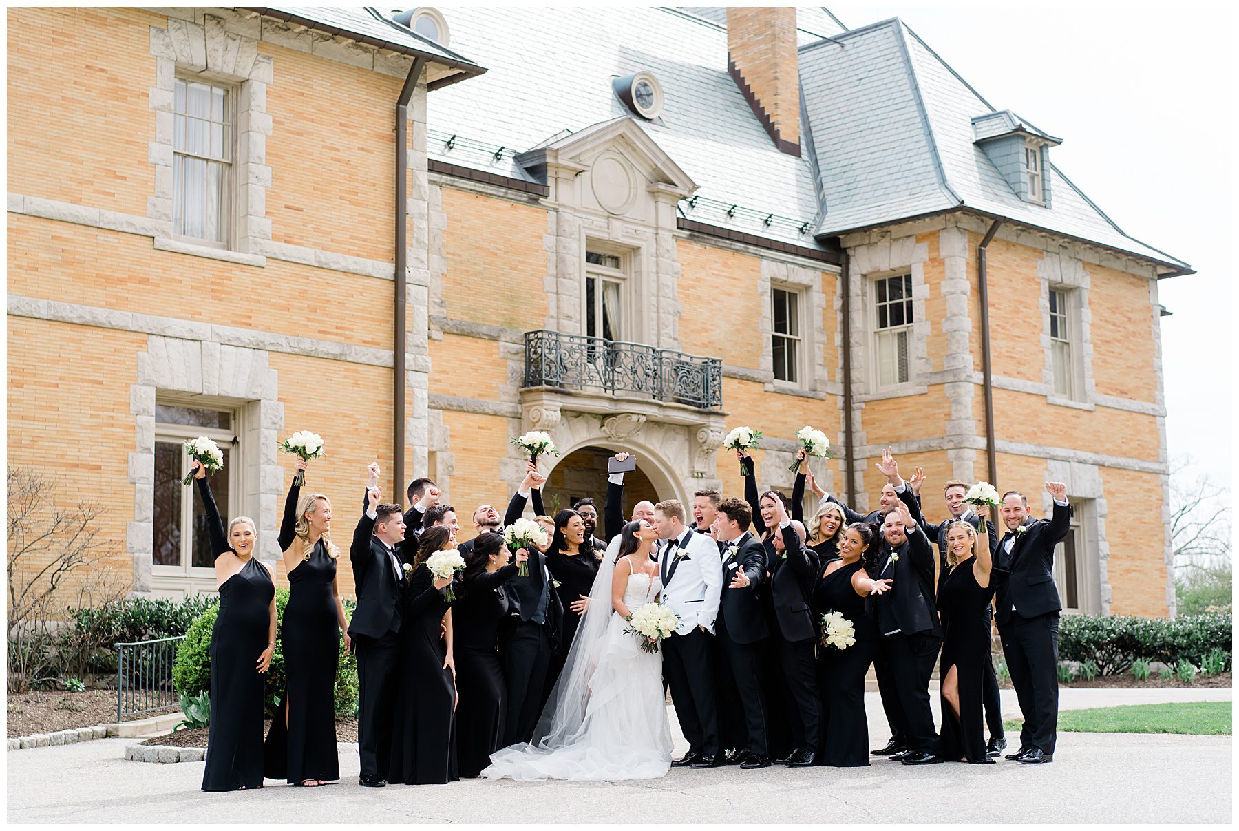 bridal party outside of Cairnwood Estate in Bryn Athyn, PA