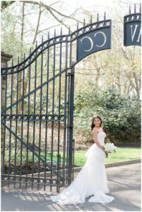 bride outside gates of Huntingdon Valley Country Club
