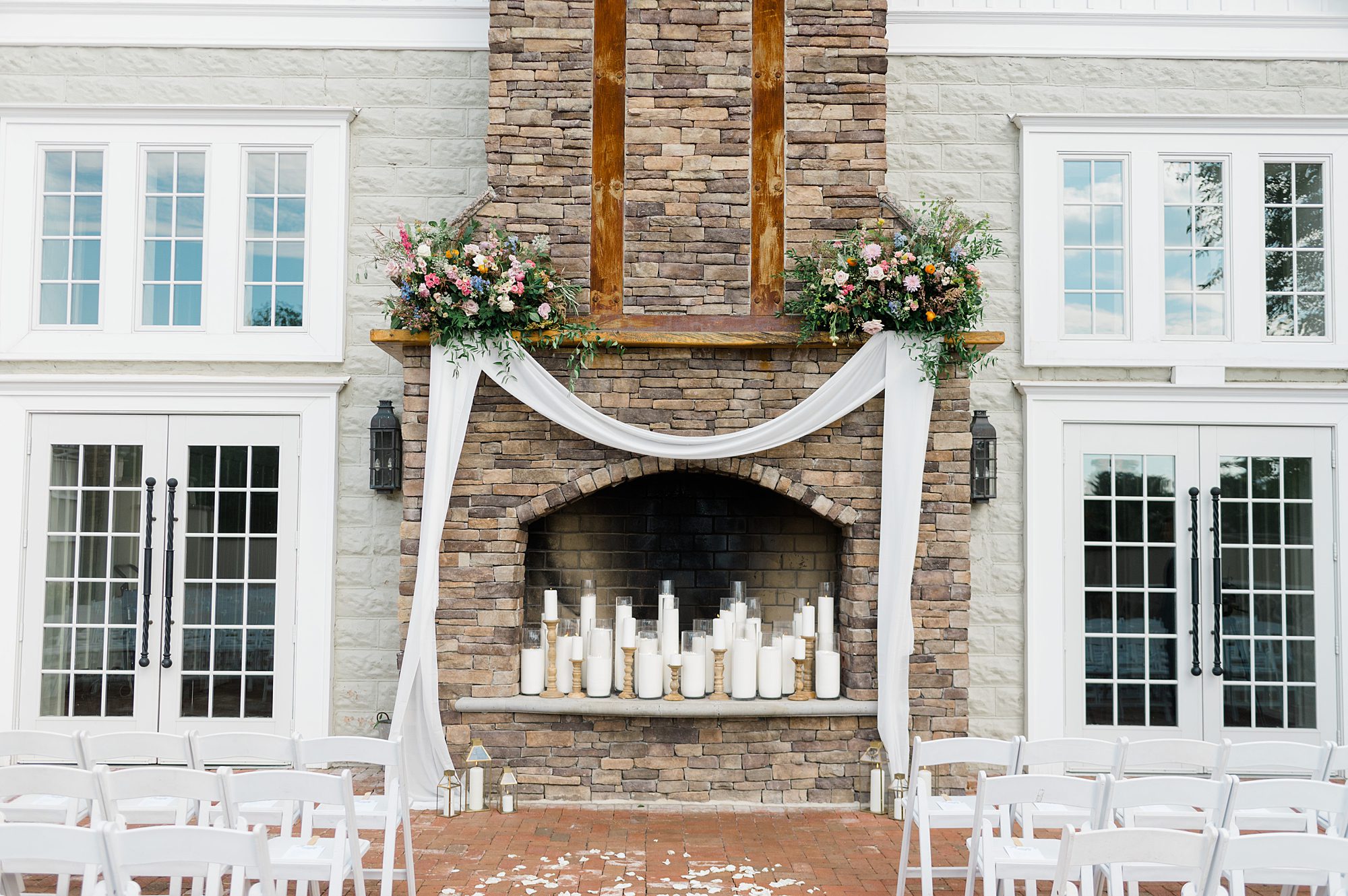 stone fireplace at the Coach house at the Ryland Inn decorated for Garden inspired wedding