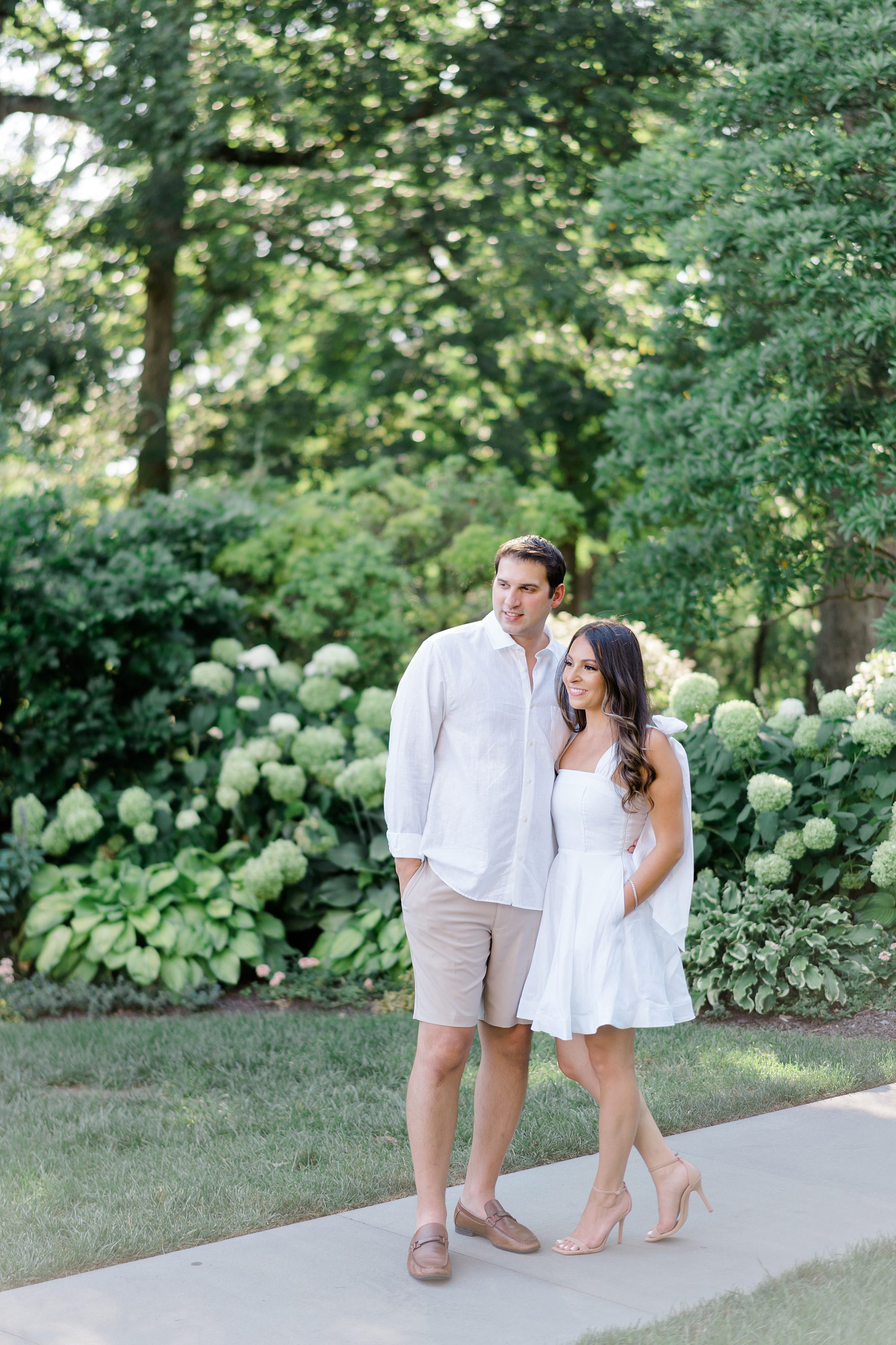 couple in the gardens at the Dreamy Cairnwood Estate for Engagement portraits