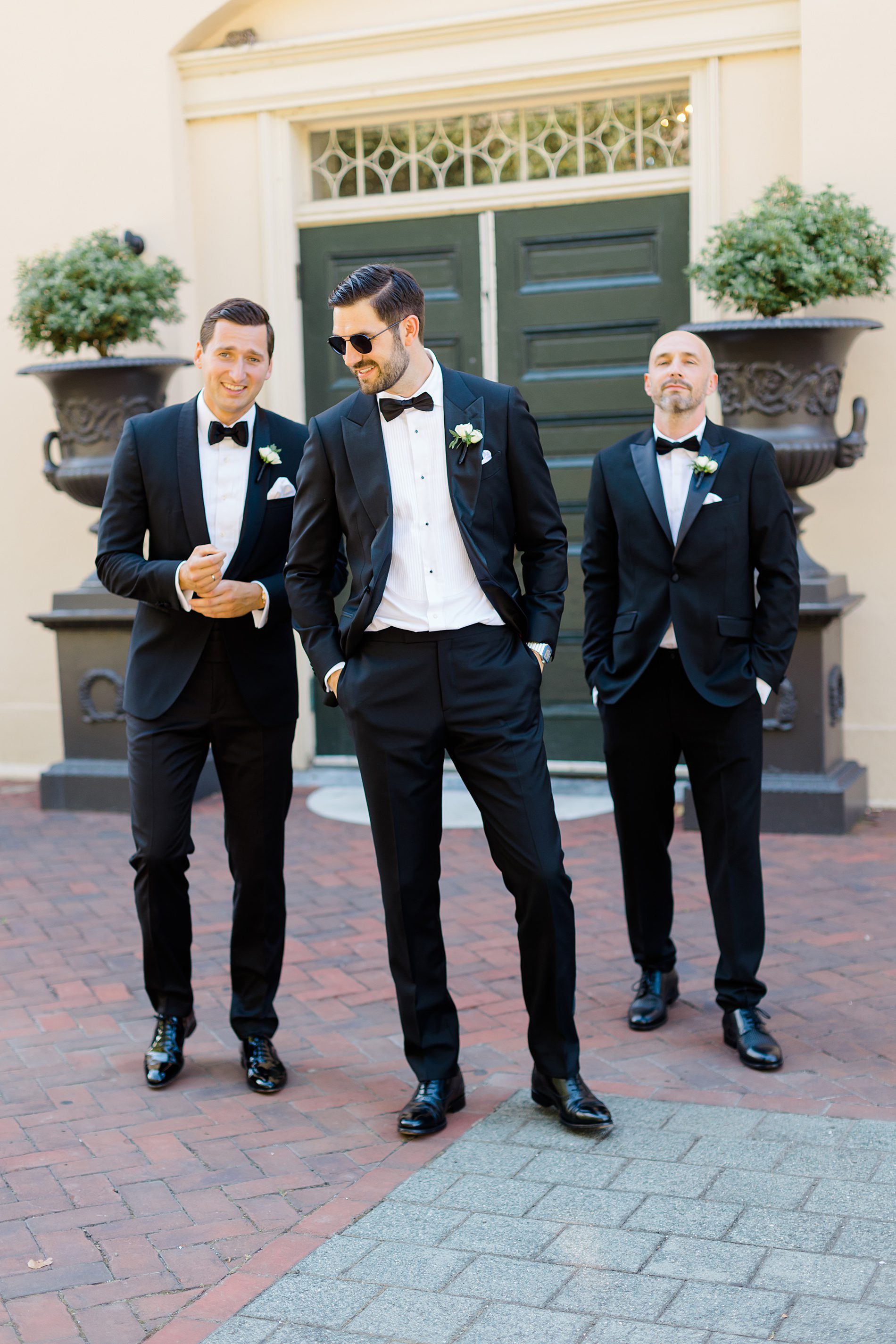 groomsmen stand together