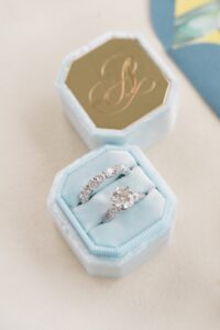 wedding rings in blue ring box