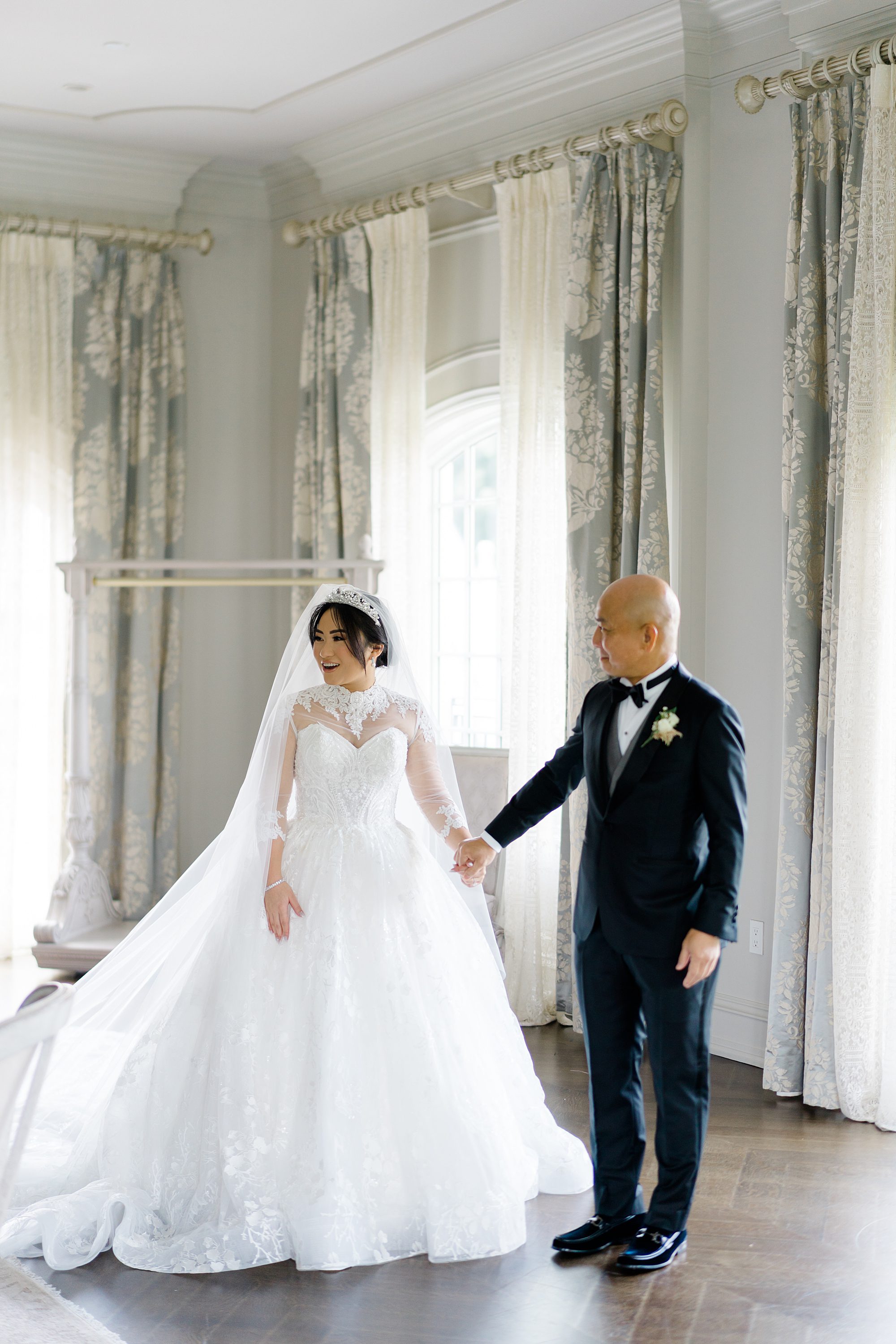 father and daughter during first look at Elegant Park Chateau Wedding