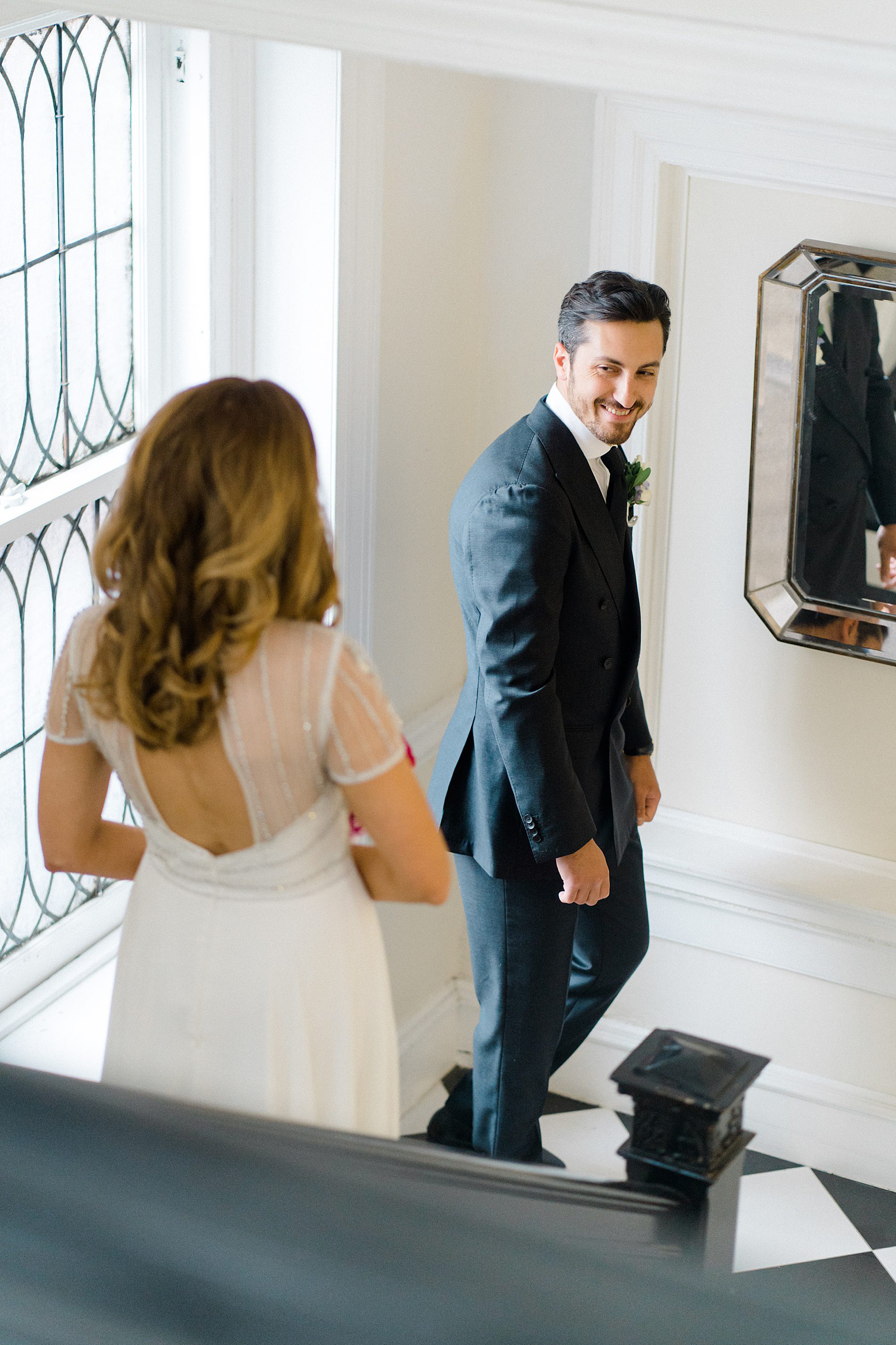 groom turns to see bride for first time on wedding day