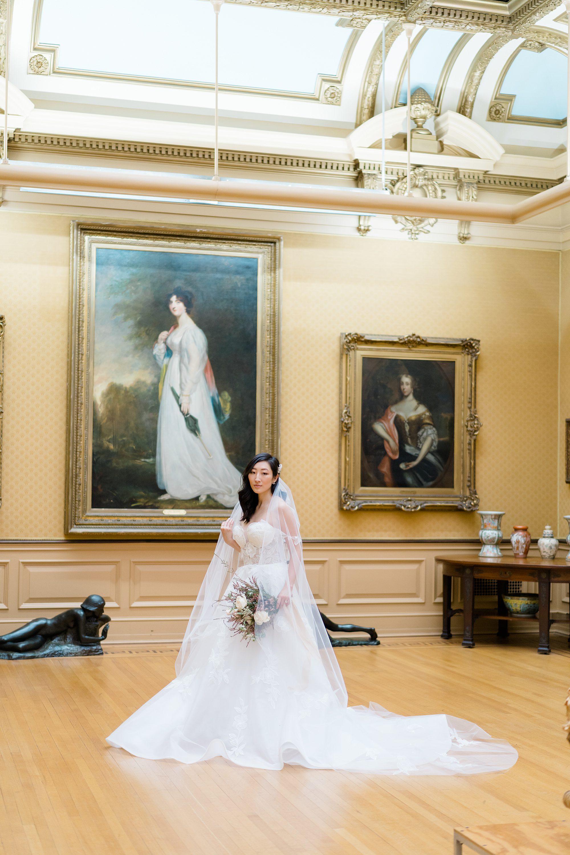 bride inside mansion with artwork