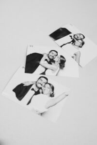 pictures of bride and groom from photo booth at wedding