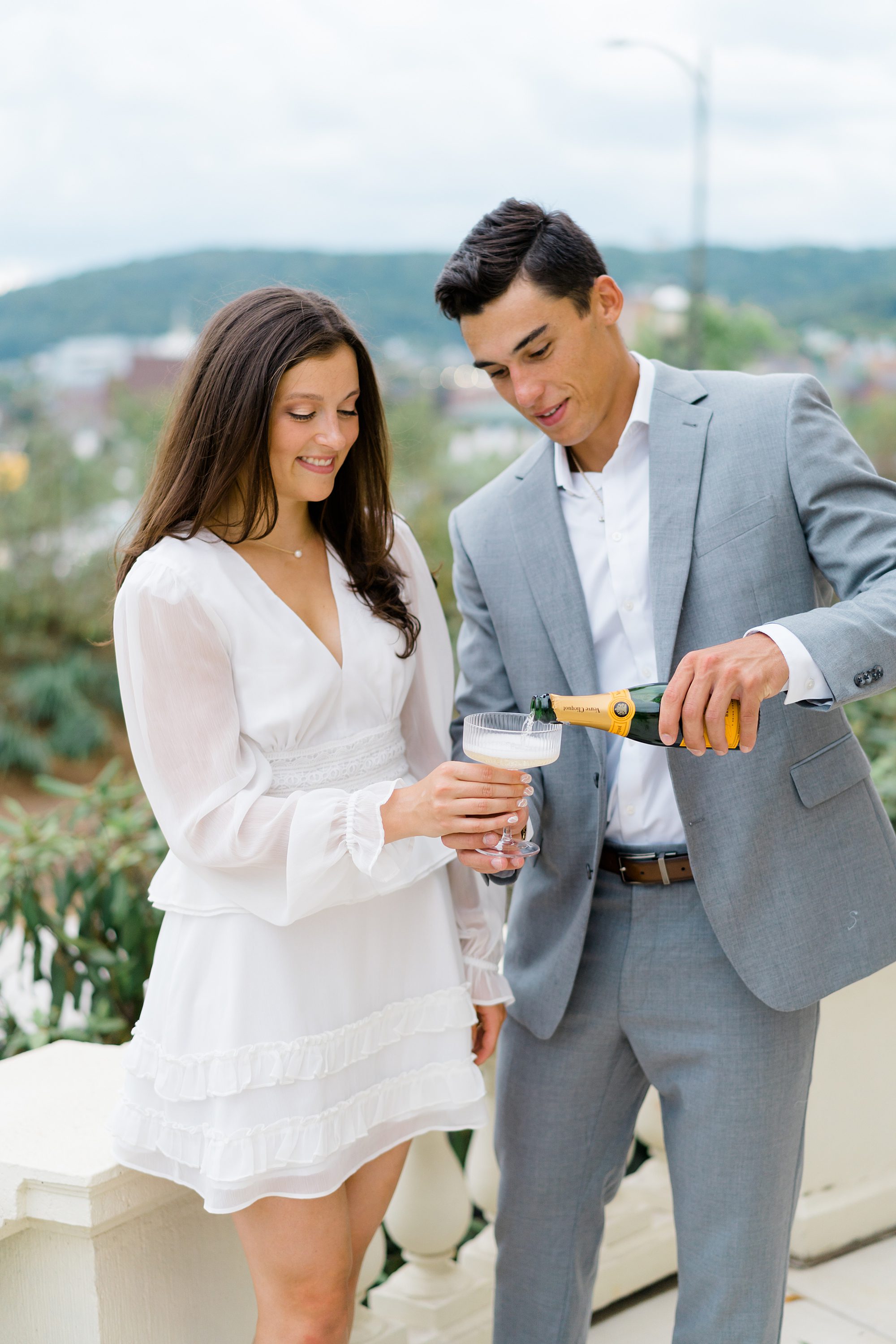 couple enjoy glass of champagne
