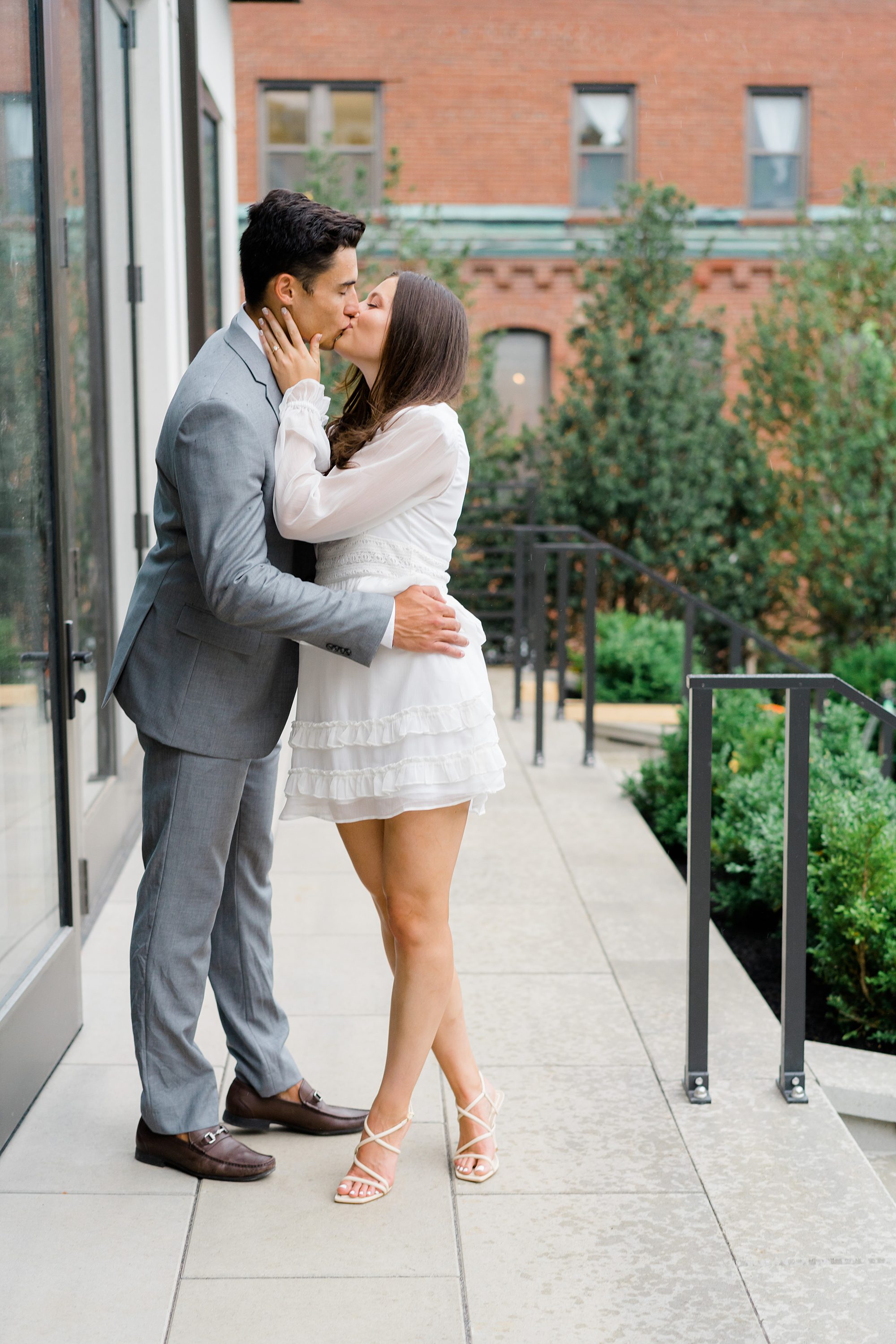 engaged couple kiss during Wilbur Mansion Engagement Session
