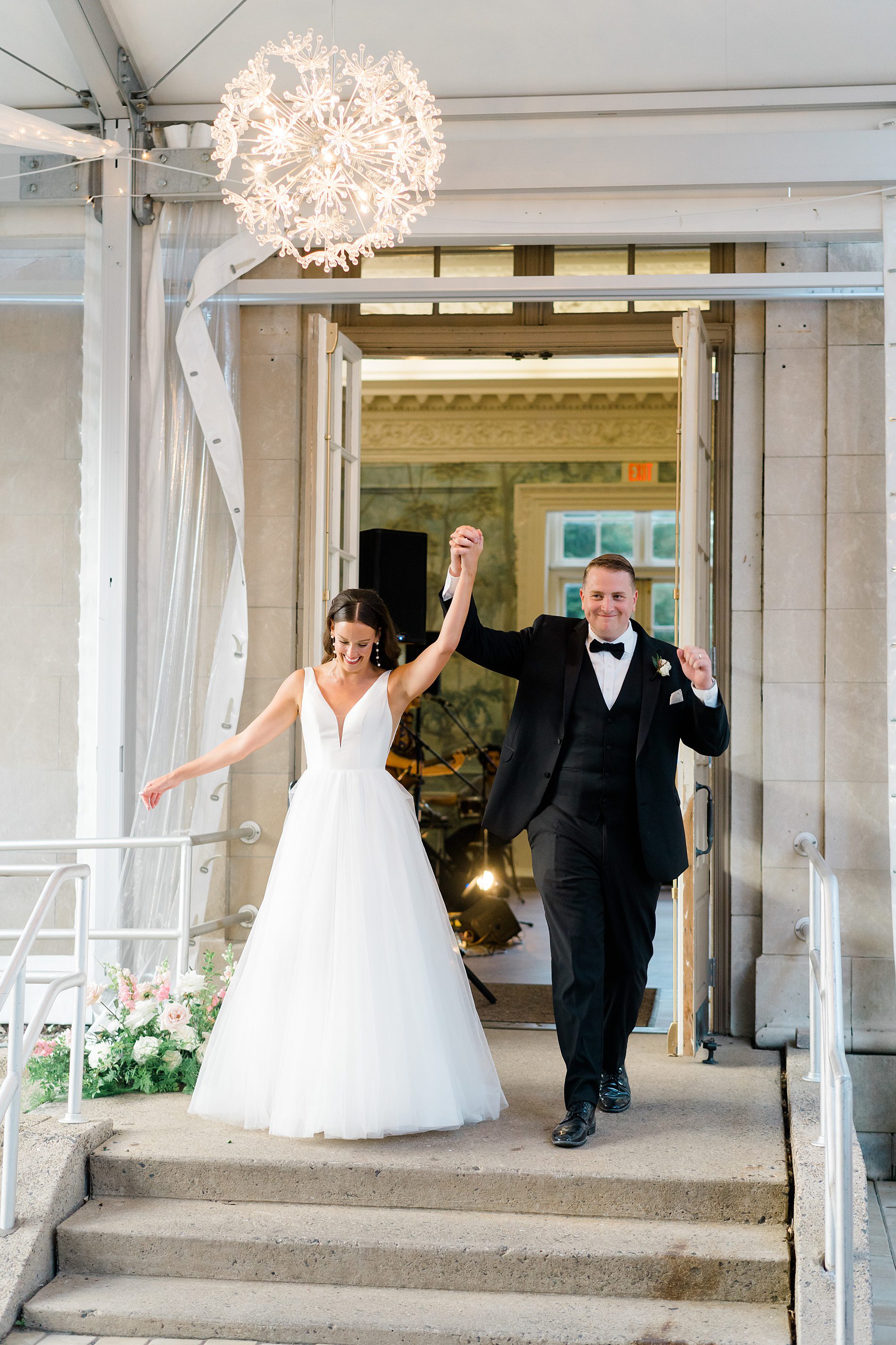 newlyweds enter Curtis Arboretum wedding reception