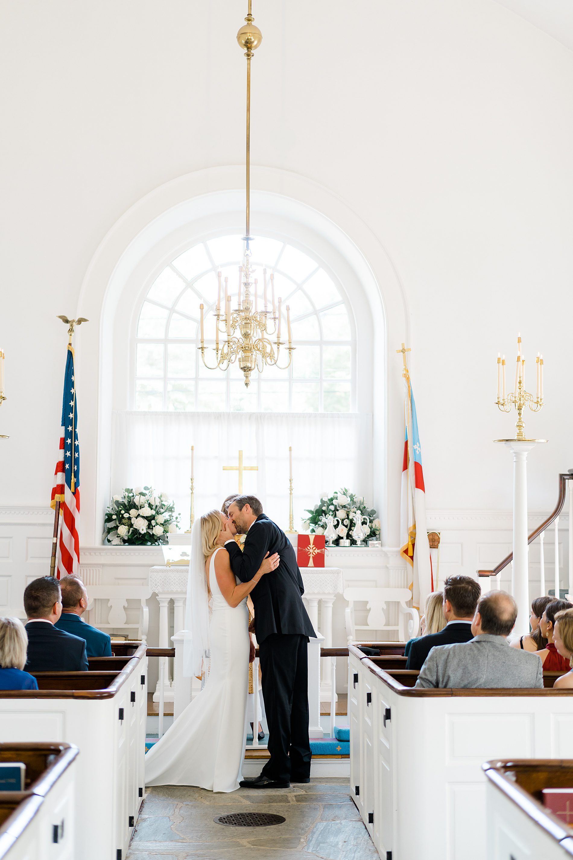 couple kiss as they are announced husband and wife