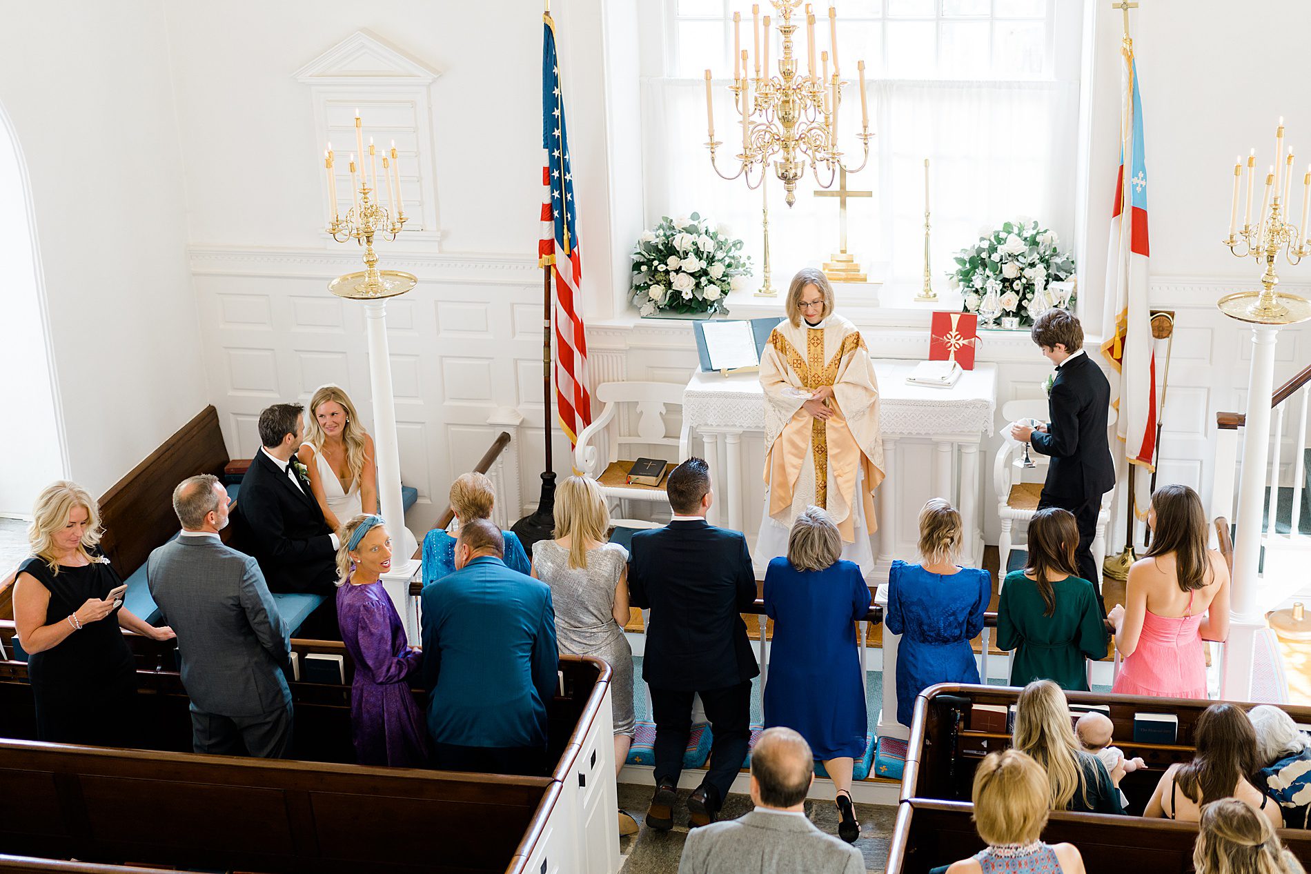 kneeling at altar during Intimate Wedding Ceremony at St. David's Episcopal Church