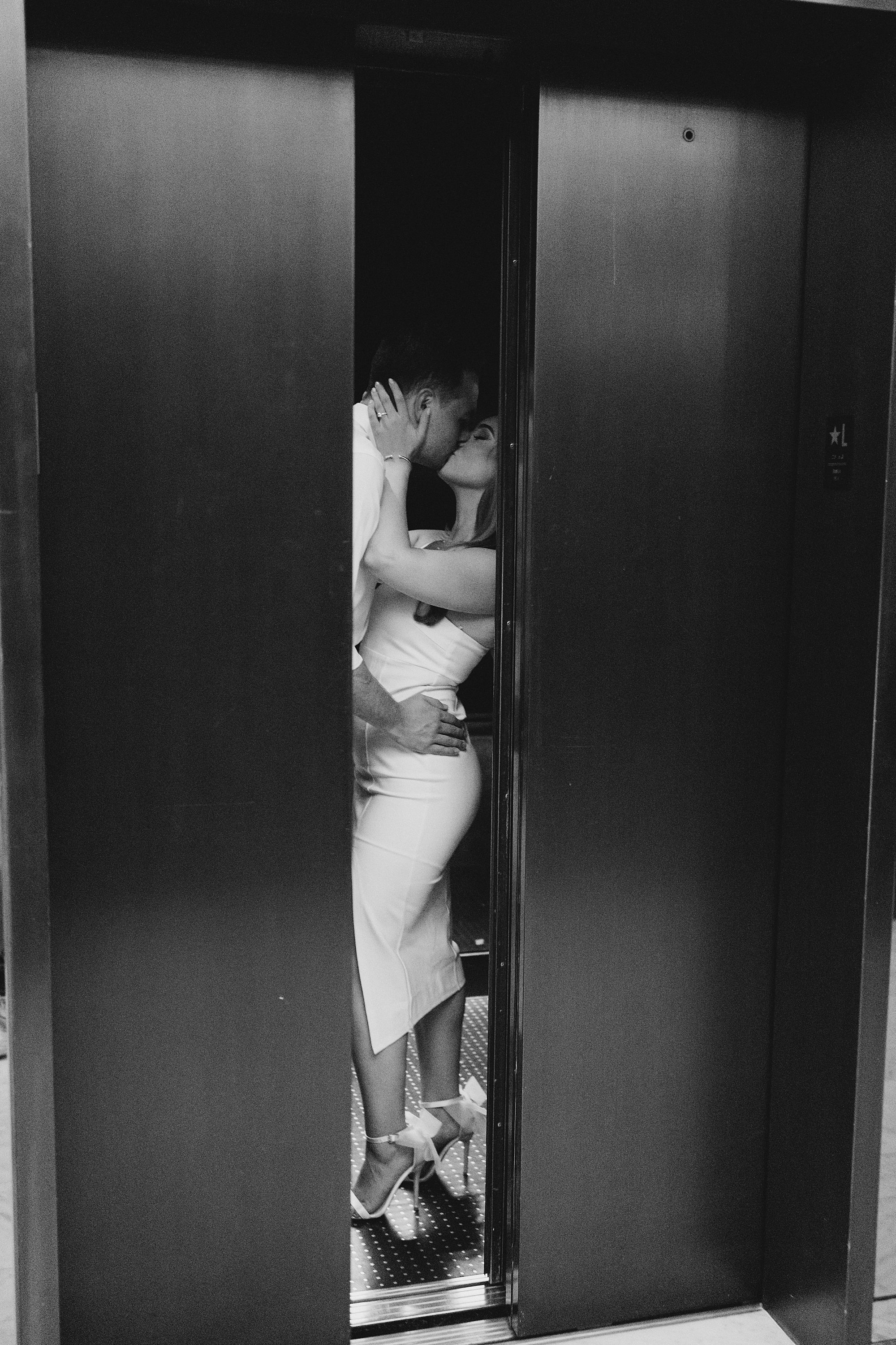 couple kiss inside room