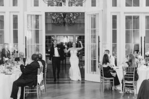 bride and groom enter wedding reception at The Ryland Inn