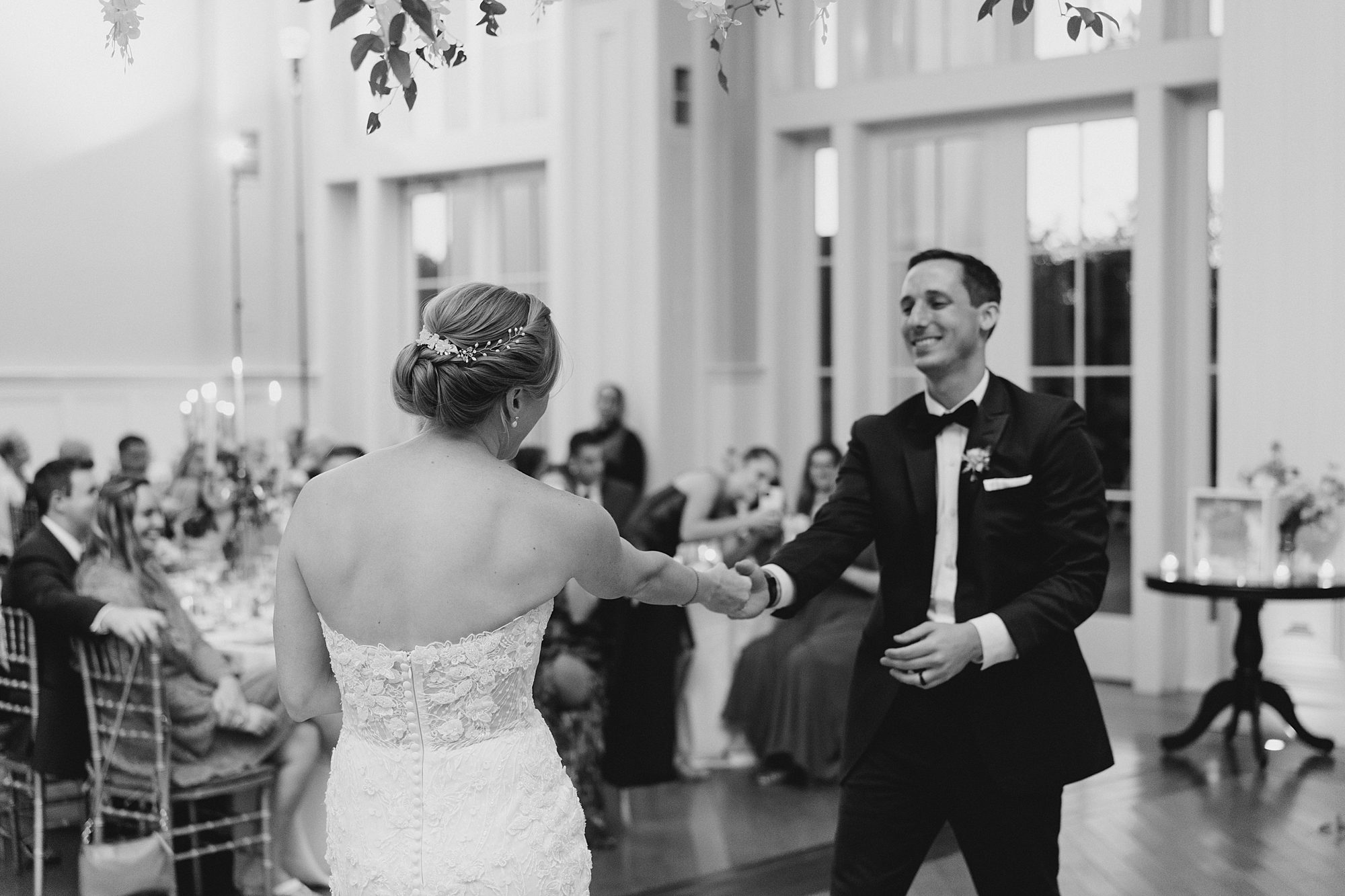 bride and groom dance together at The Ryland Inn