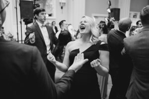 wedding guests dance at Elegant Garden Inspired Wedding reception at The Ryland Inn