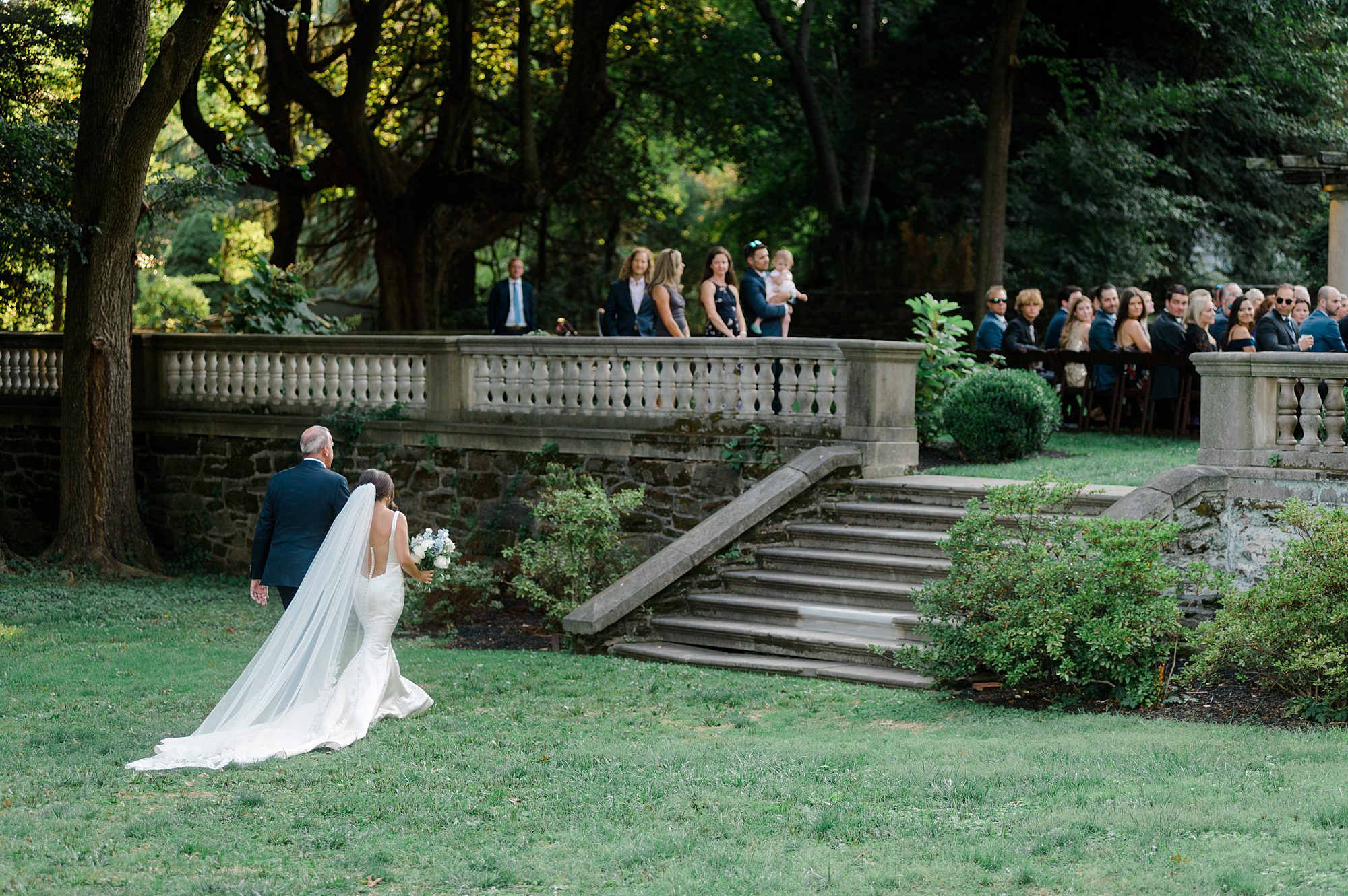 father of the bride walks daughter down the aisle at Curtis Arboretum Wedding