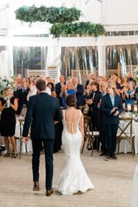 bride and groom enter Curtis Arboretum Wedding reception