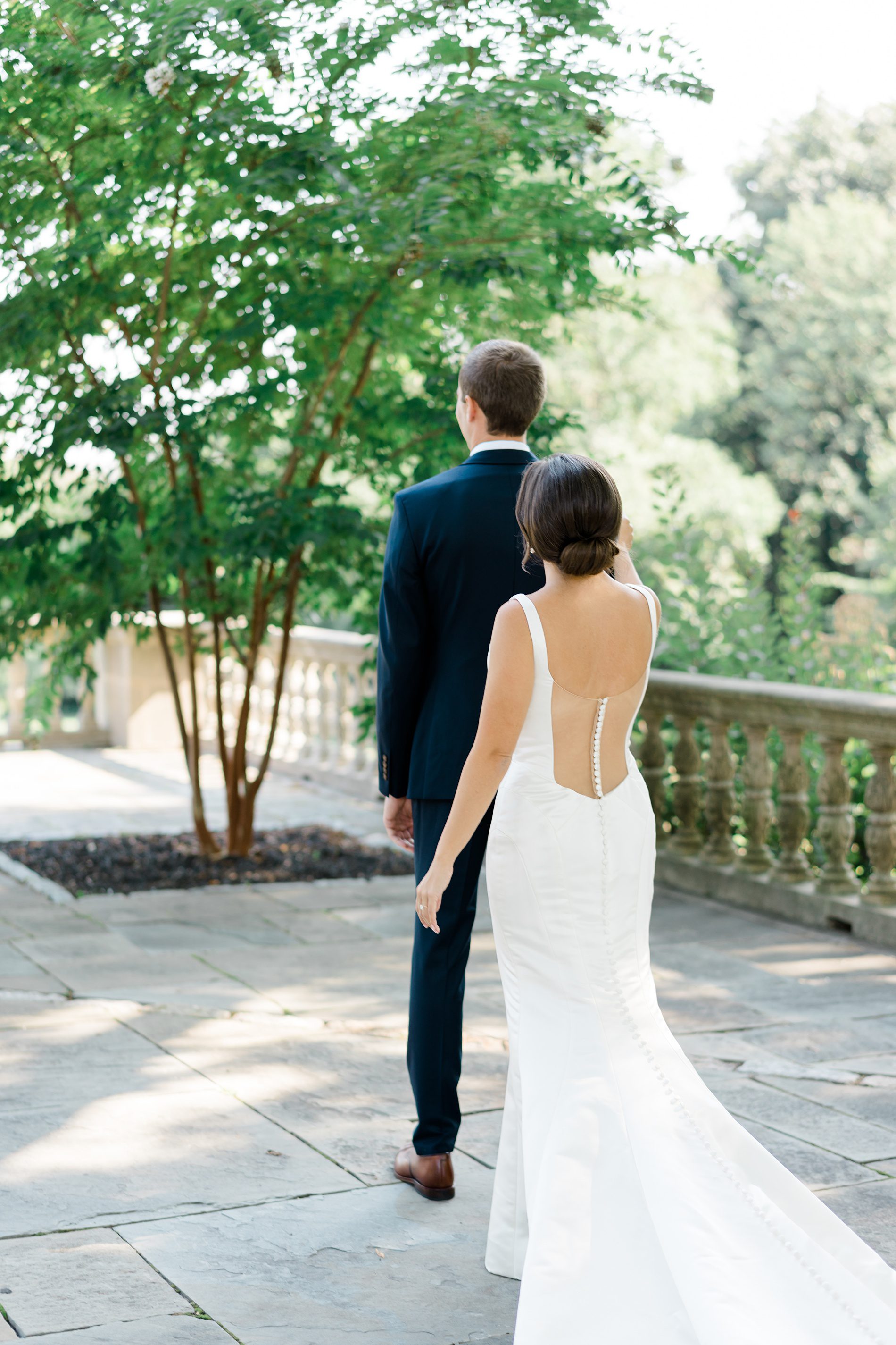 first look between bride and groom at Enchanting Curtis Arboretum Wedding